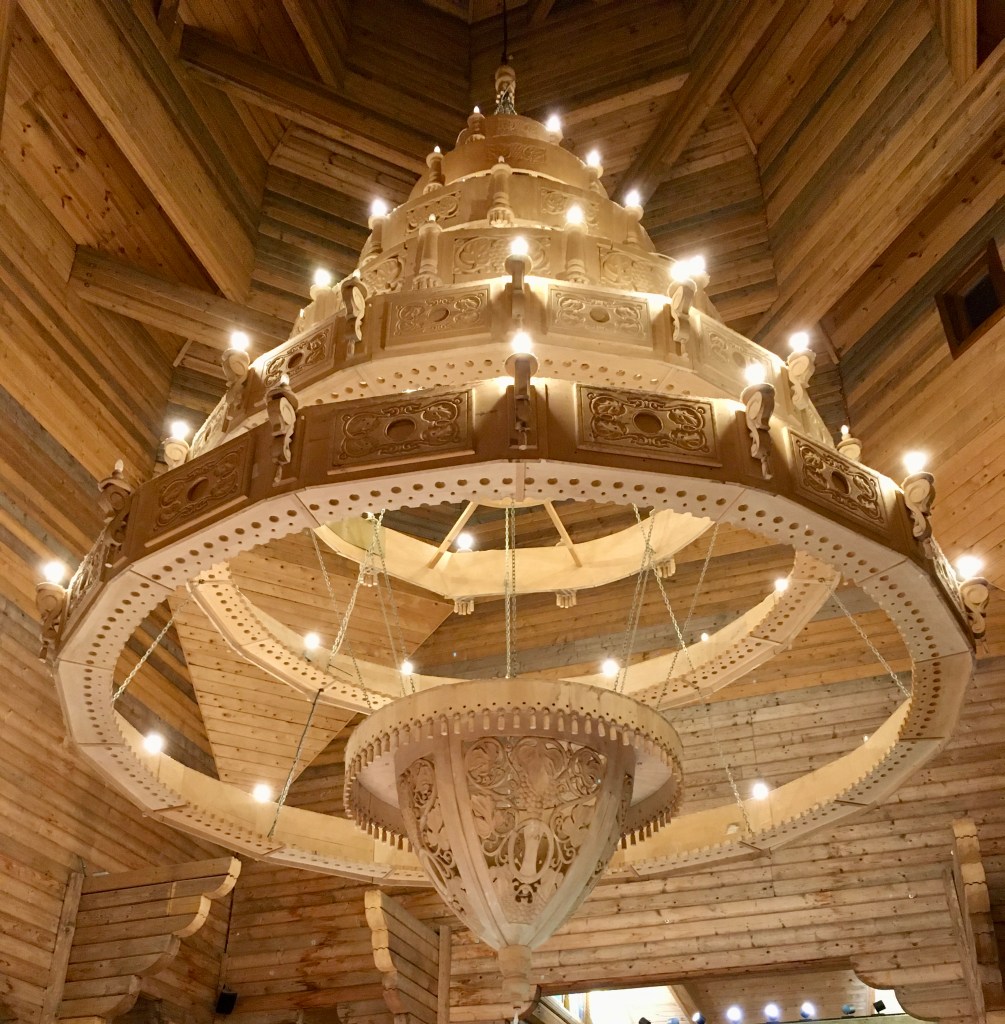 Things Helen Loves, large wooden chandelier made up of several wooden rings. Russian inspired.  Pairi Daiza resort, Belgium